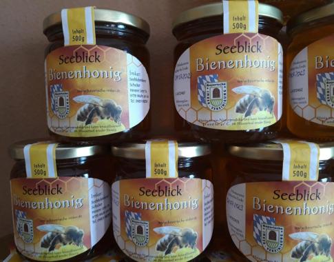 abgefüllte etikettierte Honigbilder